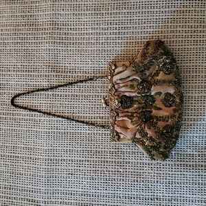 Beaded clam shell clutch wristlet